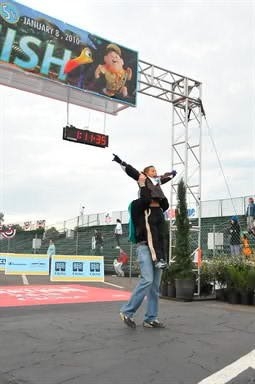 Jaylen and Uncle D at the finish line Disney and TSA 5K Run 2010