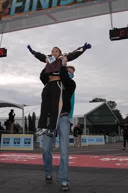 Jaylen and Uncle D at the finish line Disney and TSA 5K Run 2010