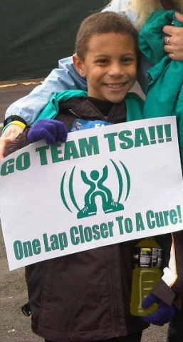 Jaylen flying the flag for the TSA Disney and TSA 5K Run 2010